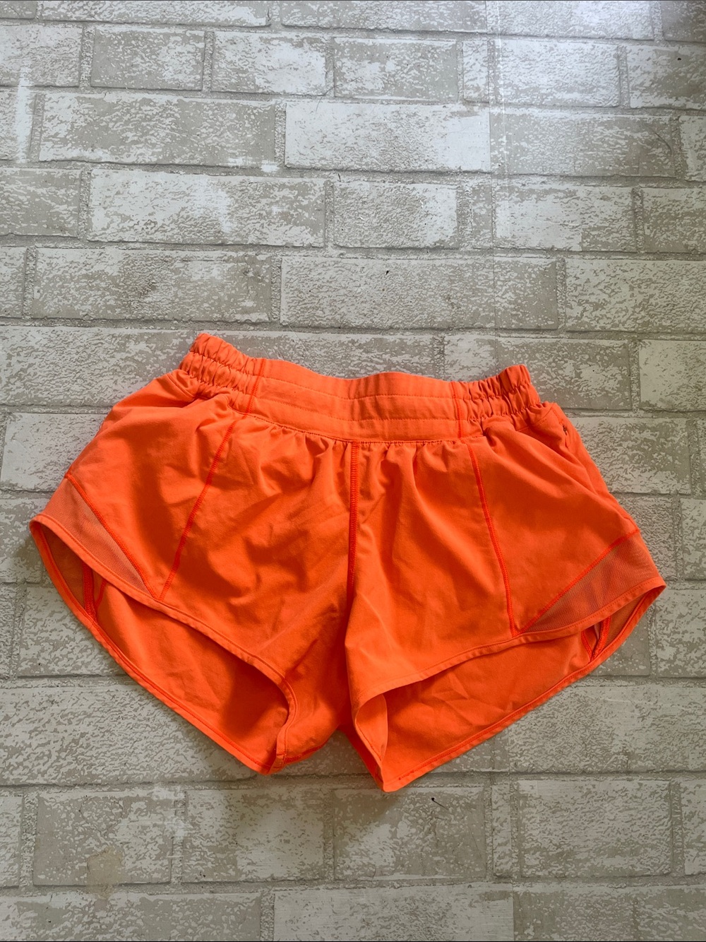 Lululemon bright orange hotty hot shorts